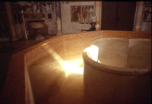 Sunlight falling on the Large Baptismal Font on th