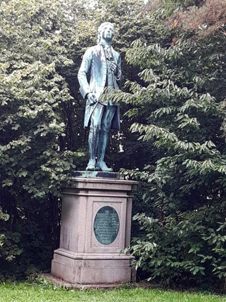 Statue of Ole Rømer in the eastern side of the cl
