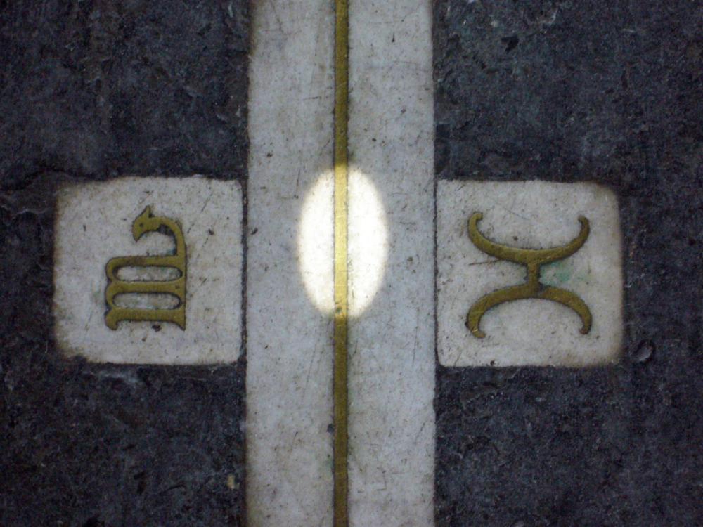 Meridian line, between the zodiac sign of Gemini a